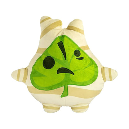A plush toy shaped like a leaf character with a green leaf face and black facial features, set against a plain white background.