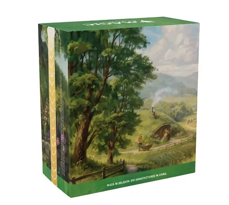 A boxed set with a green top and bottom border and a painted landscape illustration on the front, showing a forested hillside village scene. The product is photographed on a plain white background.
