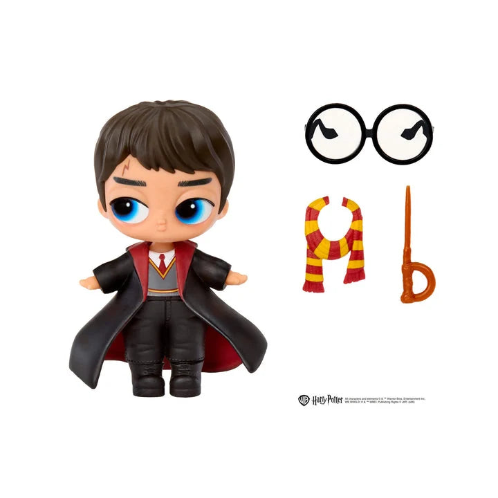 A chibi-style Harry Potter figure with detachable accessories shown on a white background, including round glasses, a red and yellow striped scarf, and a wand. A small Harry Potter logo is visible near the bottom right.