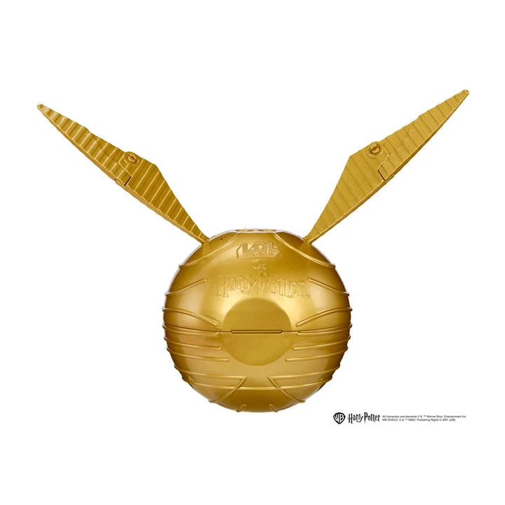 A golden metallic Harry Potter Snitch toy against a plain white background, featuring the embossed 'Harry Potter' and 'Wizards of the Coast' logos.
