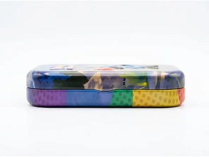 A rectangular metal pencil case with rounded corners, featuring a colorful abstract pattern on the top half and a striped pattern of purple, blue, green, and yellow polka dots on the bottom half, set against a plain white background.