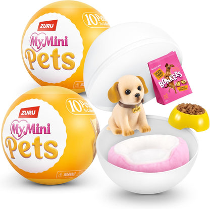 ZURU MyMini Pets toy set showing a white plastic pet capsule with a small puppy figure, a pink pet bed, a yellow food bowl with kibble, and two yellow-and-white ball packages labeled ZURU MyMini Pets. A pink bag labeled BONEERS is also shown as included accessory content.