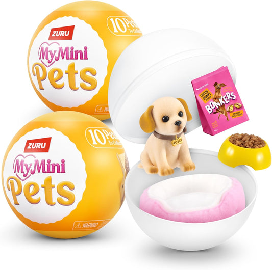 ZURU MyMini Pets toy set showing a white plastic pet capsule with a small puppy figure, a pink pet bed, a yellow food bowl with kibble, and two yellow-and-white ball packages labeled ZURU MyMini Pets. A pink bag labeled BONEERS is also shown as included accessory content.